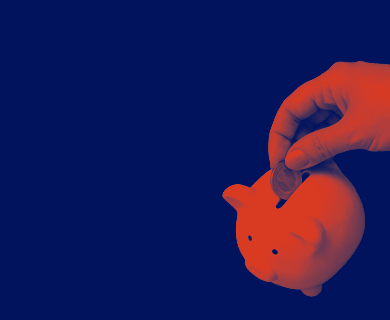 Small Image Of Hand Placing A Coin In A Piggy Bank